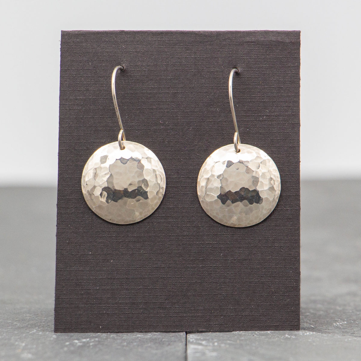 Rebecca Wicklund - Large convex round hammered silver earrings