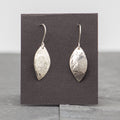 Rebecca Wicklund - Large convex hammered silver leaf earrings