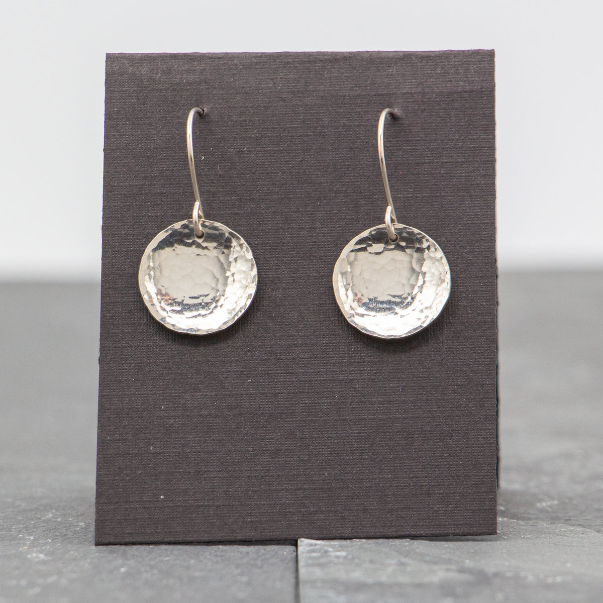 Rebecca Wicklund - Medium concave round hammered silver earrings