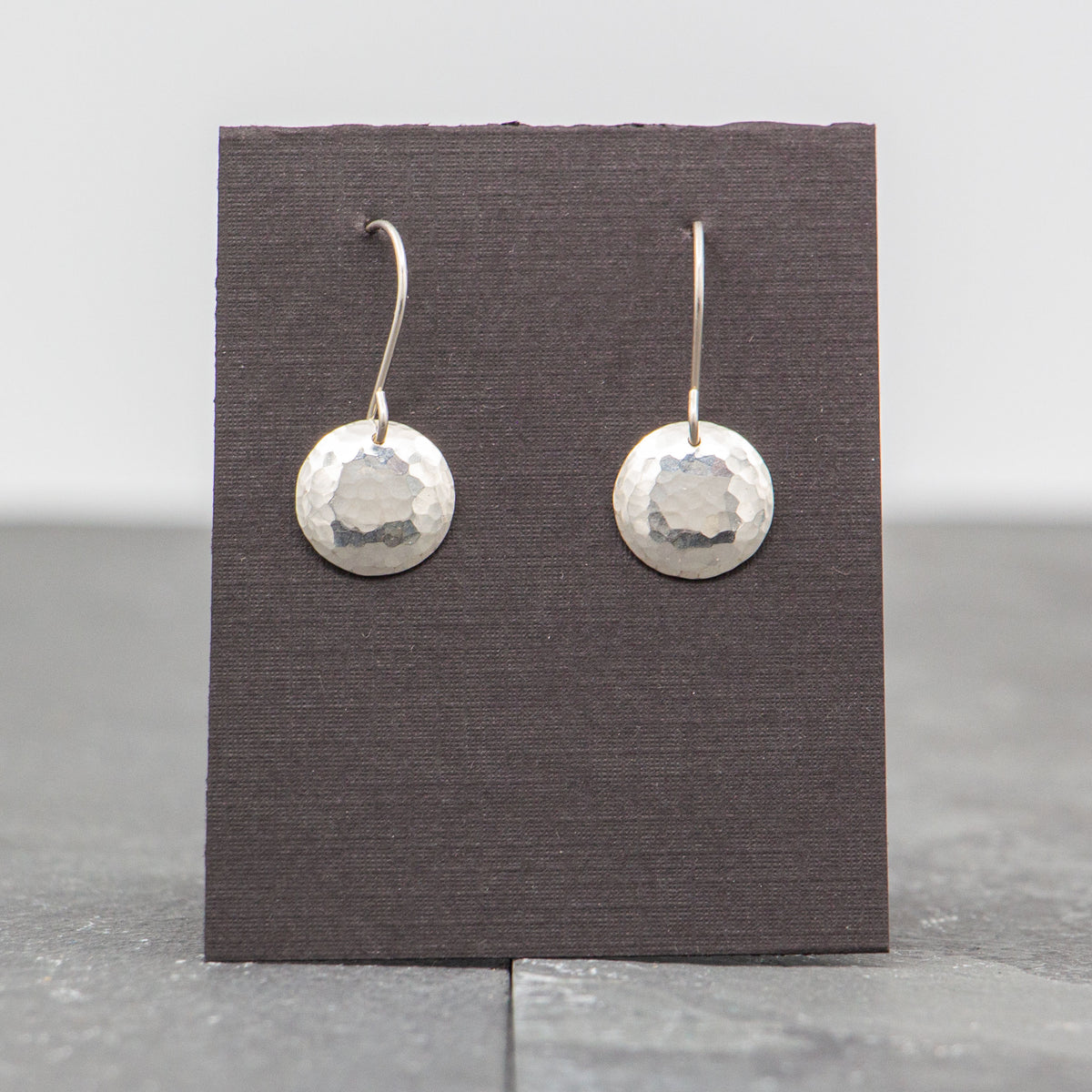 Rebecca Wicklund - Small convex round hammered silver earrings