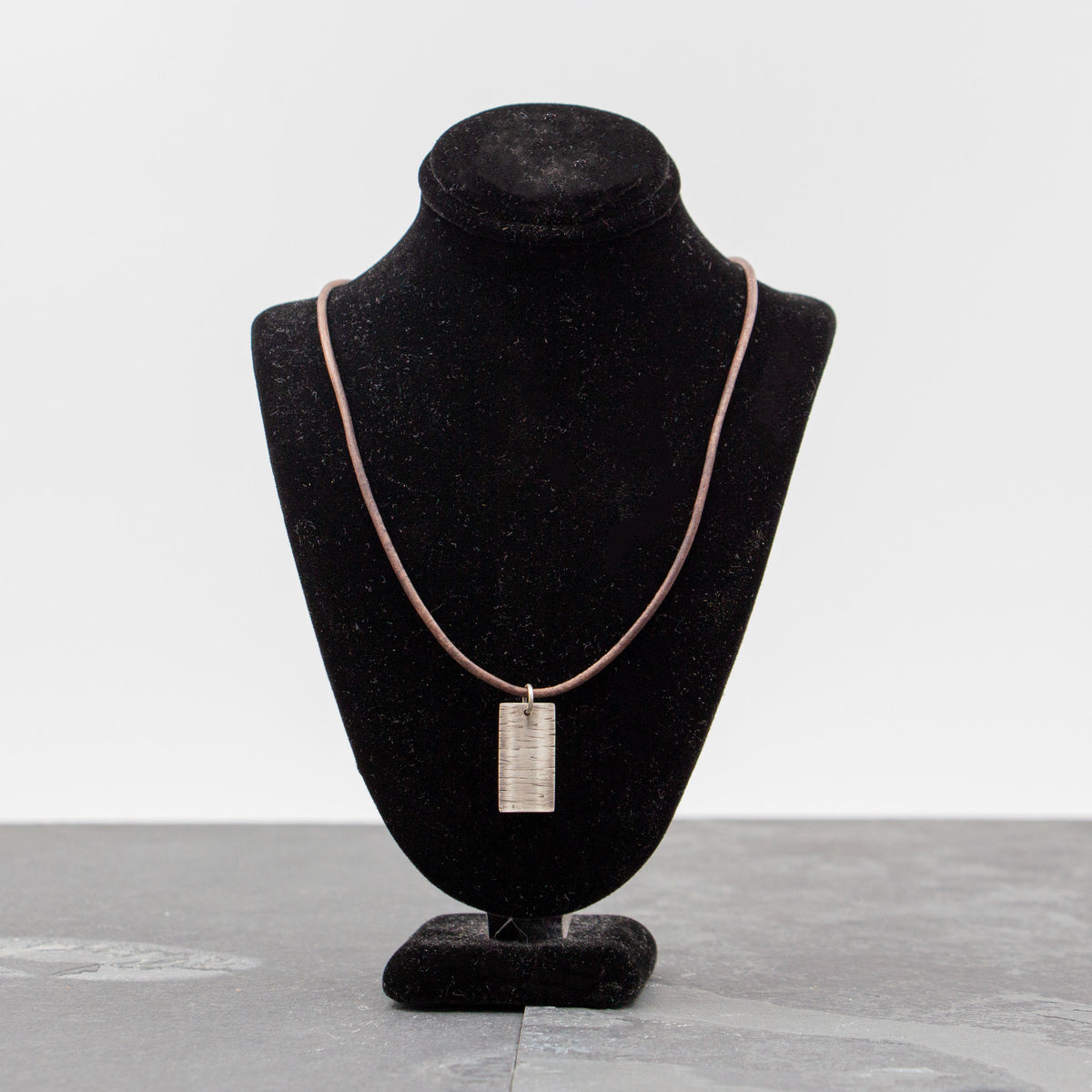 Rebecca Wicklund - Birch necklace on gray/brown leather 18”